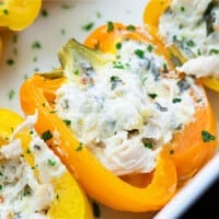 healthy stuffed peppers in white baking dish