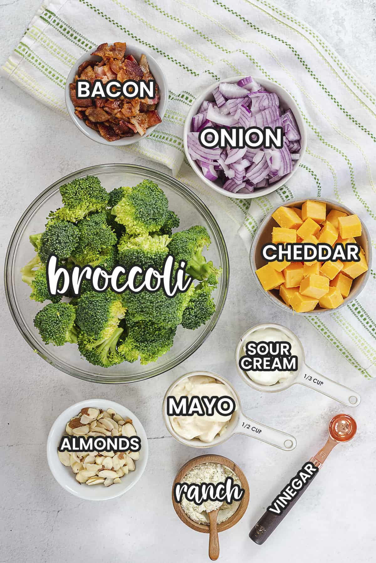 Ingredients for keto broccoli salad on counter.