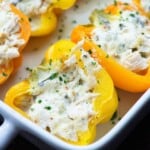 low carb stuffed peppers in white baking dish