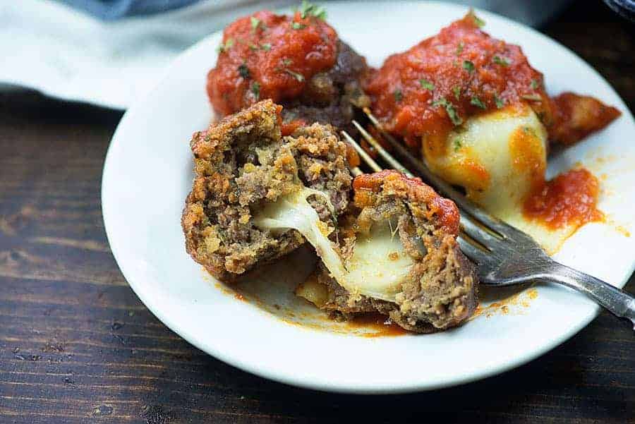 mozzarella stuffed meatballs on plate