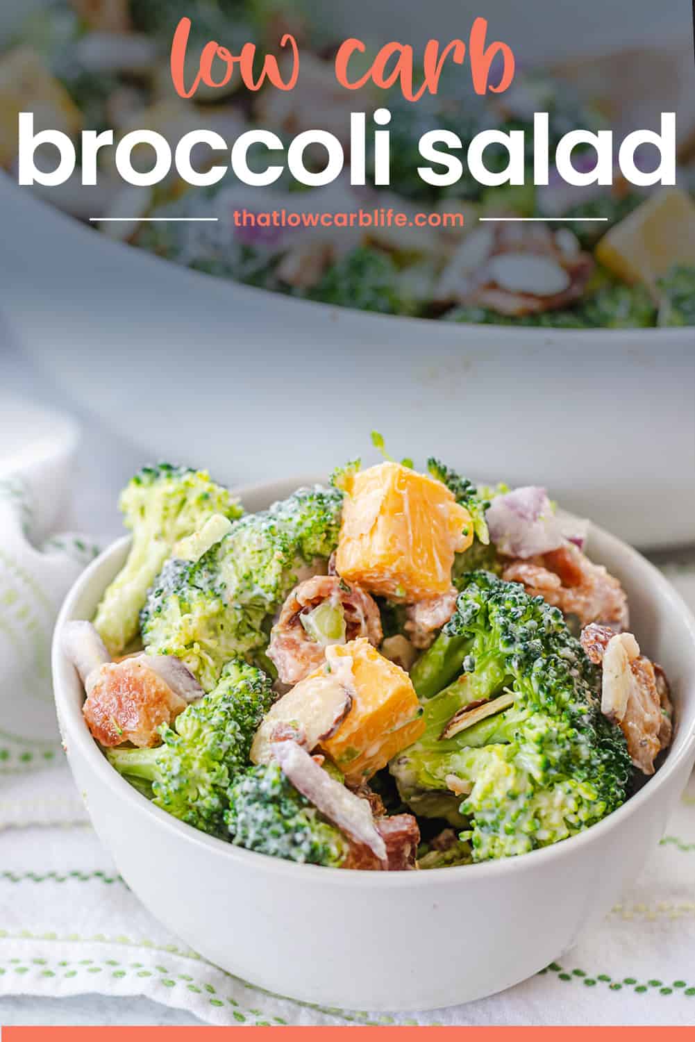 Broccoli salad with bacon in small white bowl.