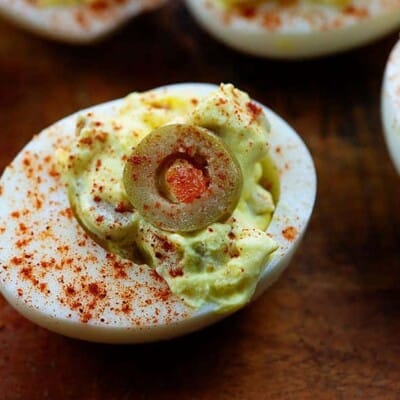 healthy deviled eggs on cutting board