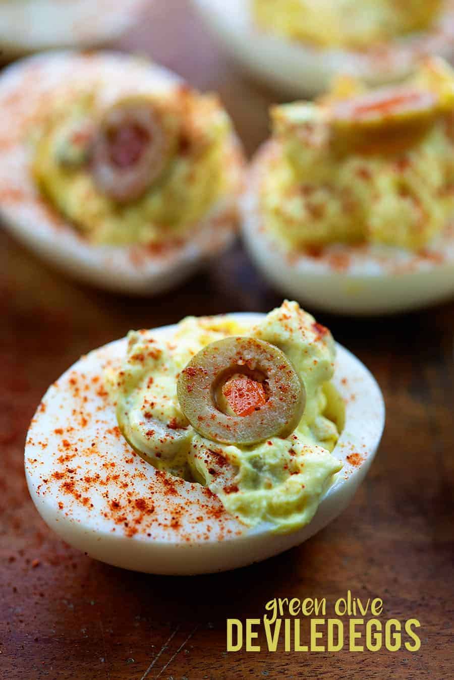Prepared deviled eggs on a table.