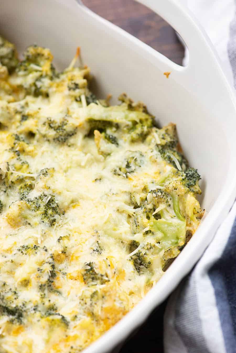 low carb broccoli casserole in white baking dish