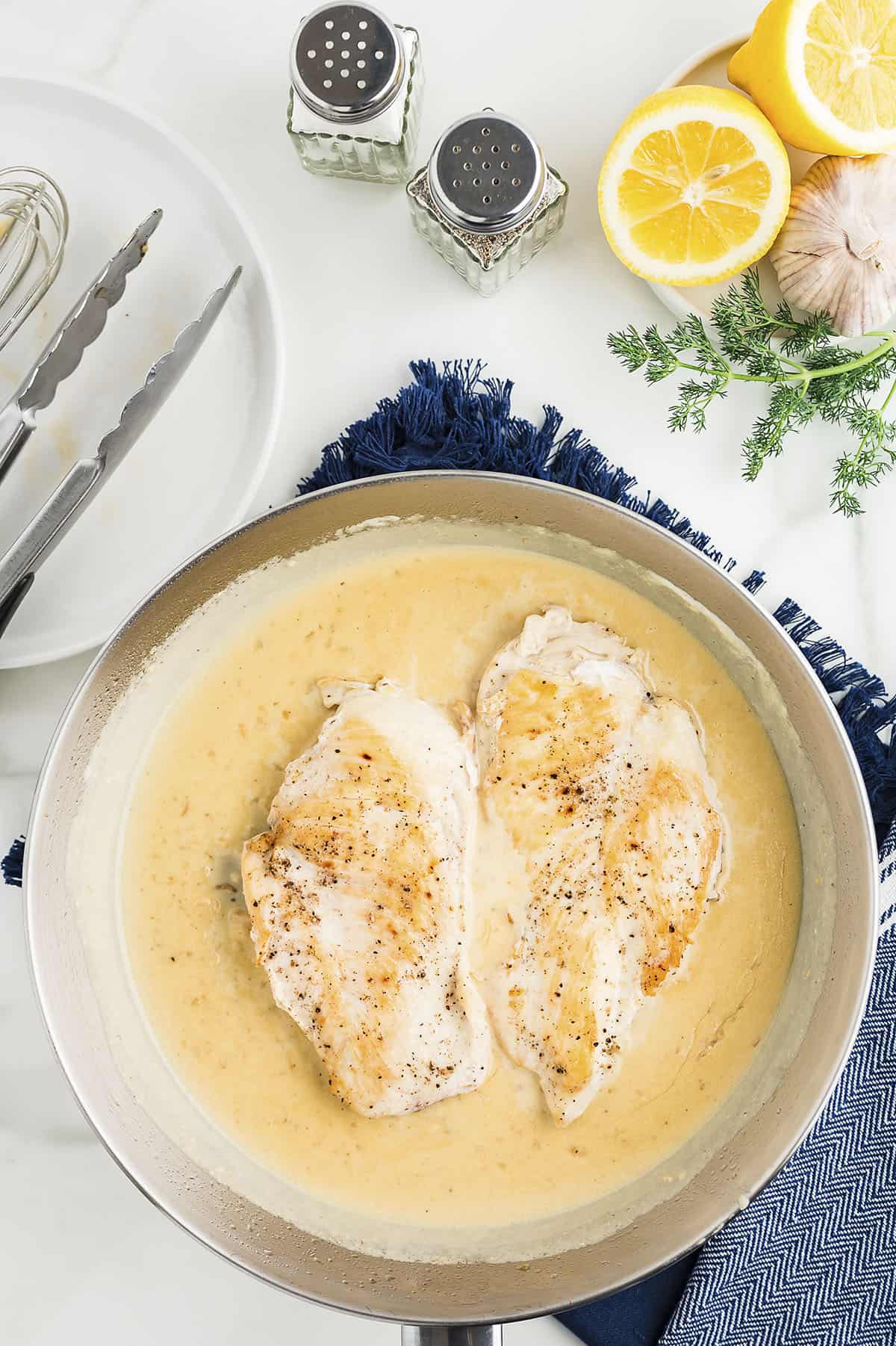 Chicken breasts in lemon garlic sauce.