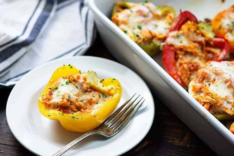 chicken parmesan stuffed peppers on white plate