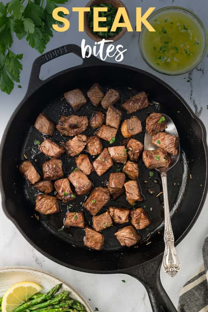 Skillet full of garlic butter steak bites.