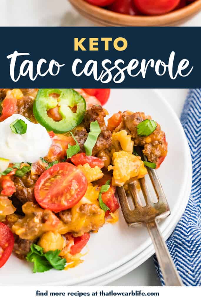 Keto taco casserole on white plate with fork.