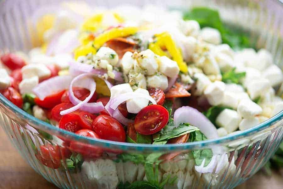 cauliflower salad ingredients in glass bowl