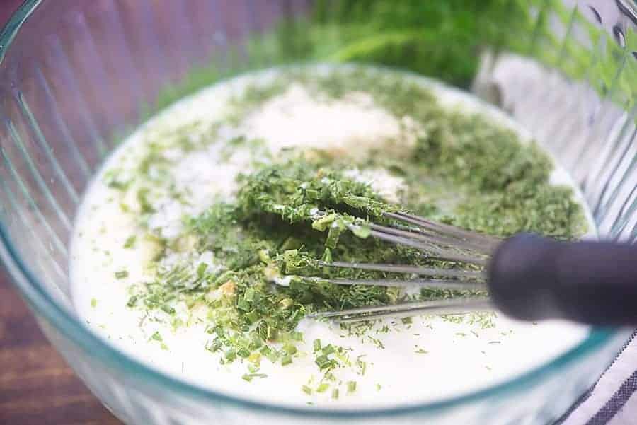 ranch dressing ingredients in glass bowl