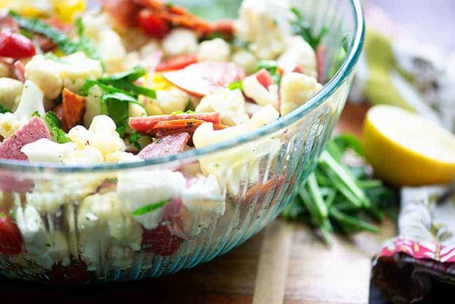 low carb cauliflower salad in glass bowl