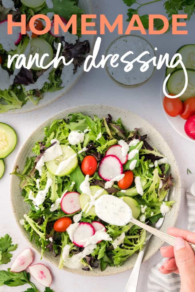 Homemade ranch dressing drizzled on saladl.