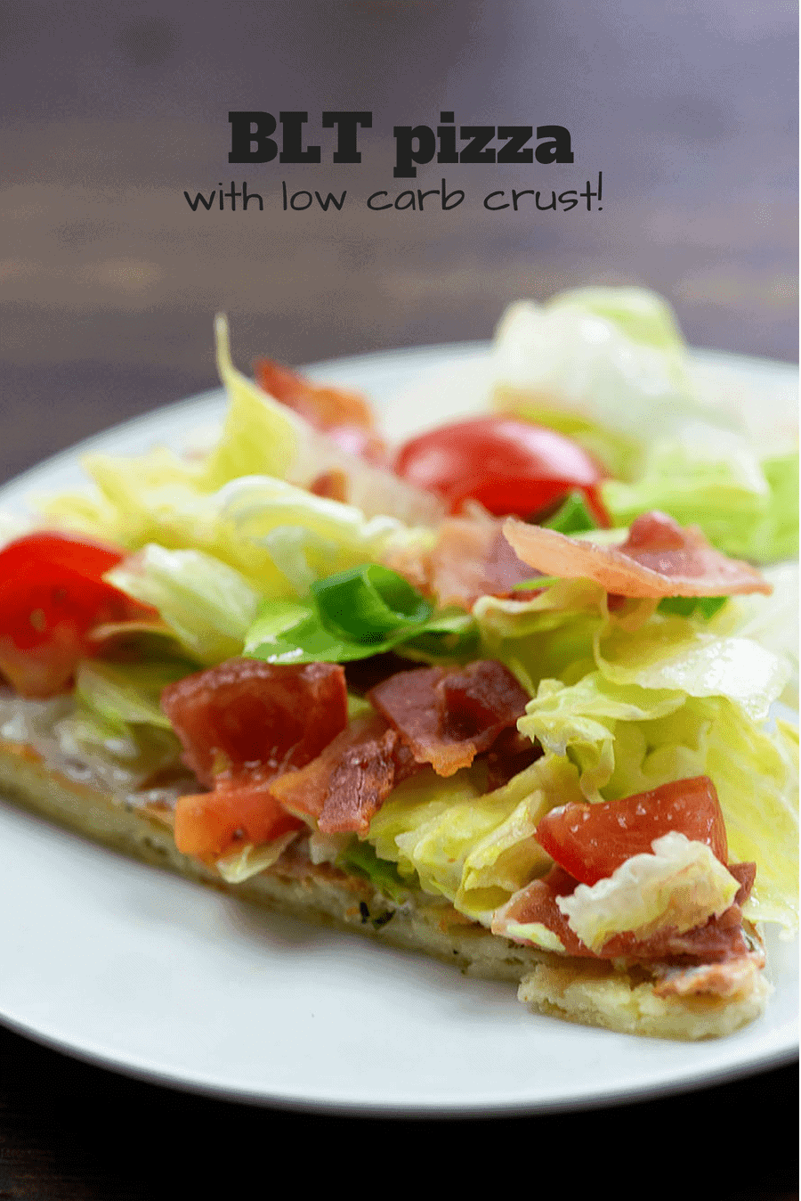 A BLT pizza on a white plate