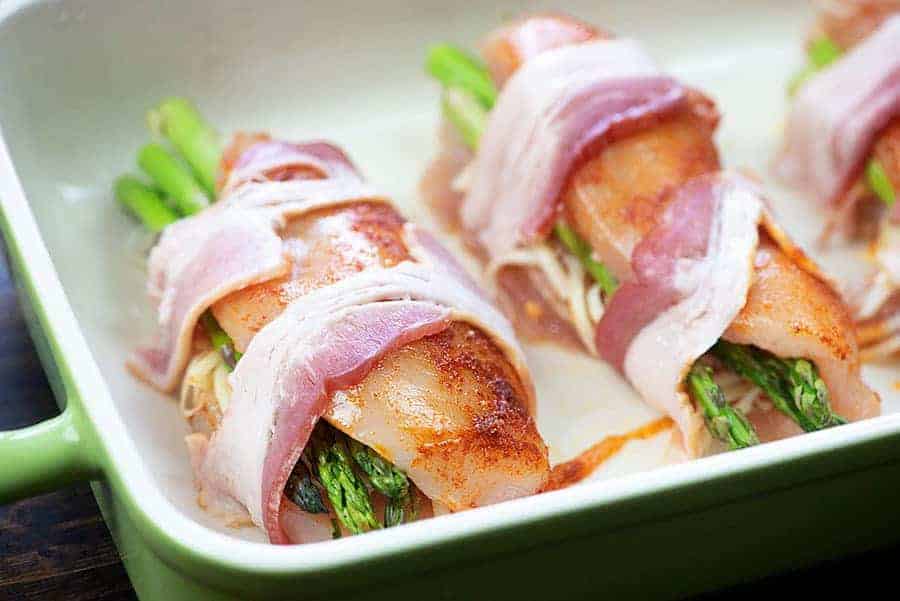 bacon wrapped chicken in baking dish