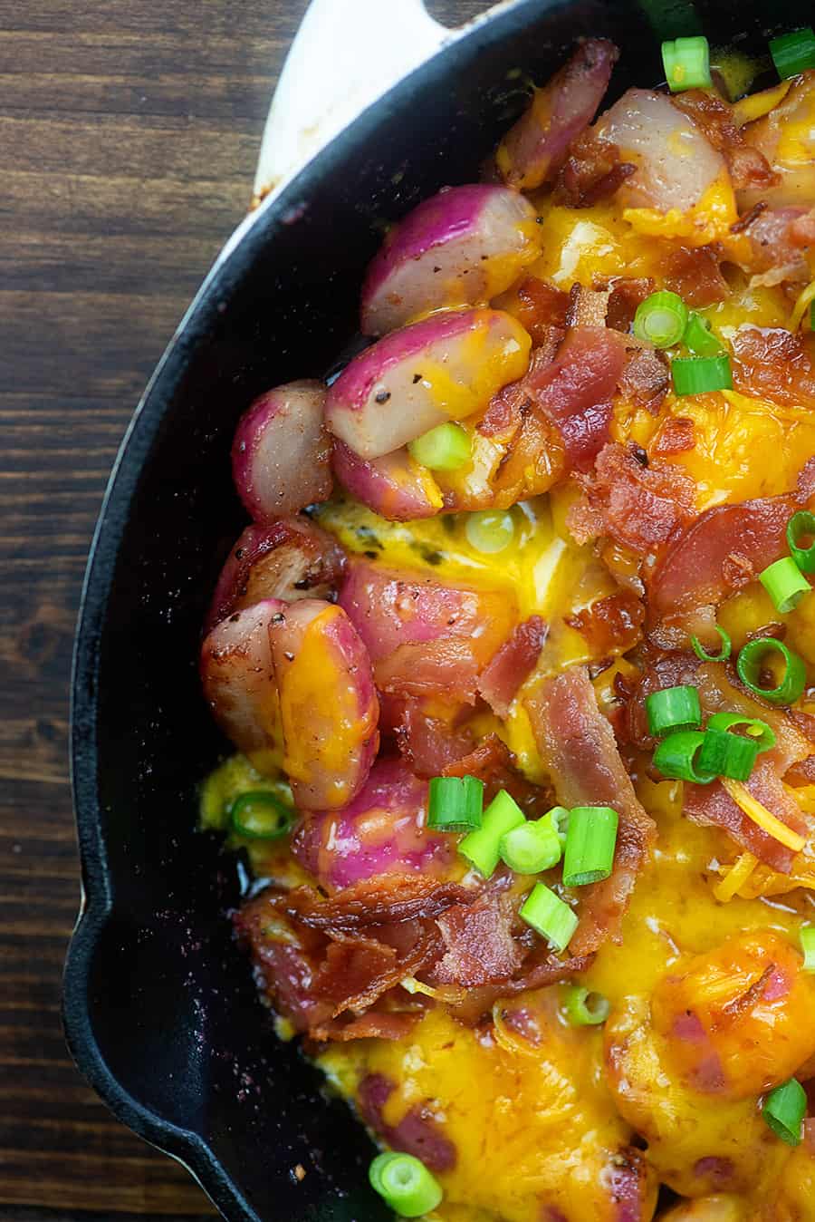 A bowl of food, with Bacon and Radish