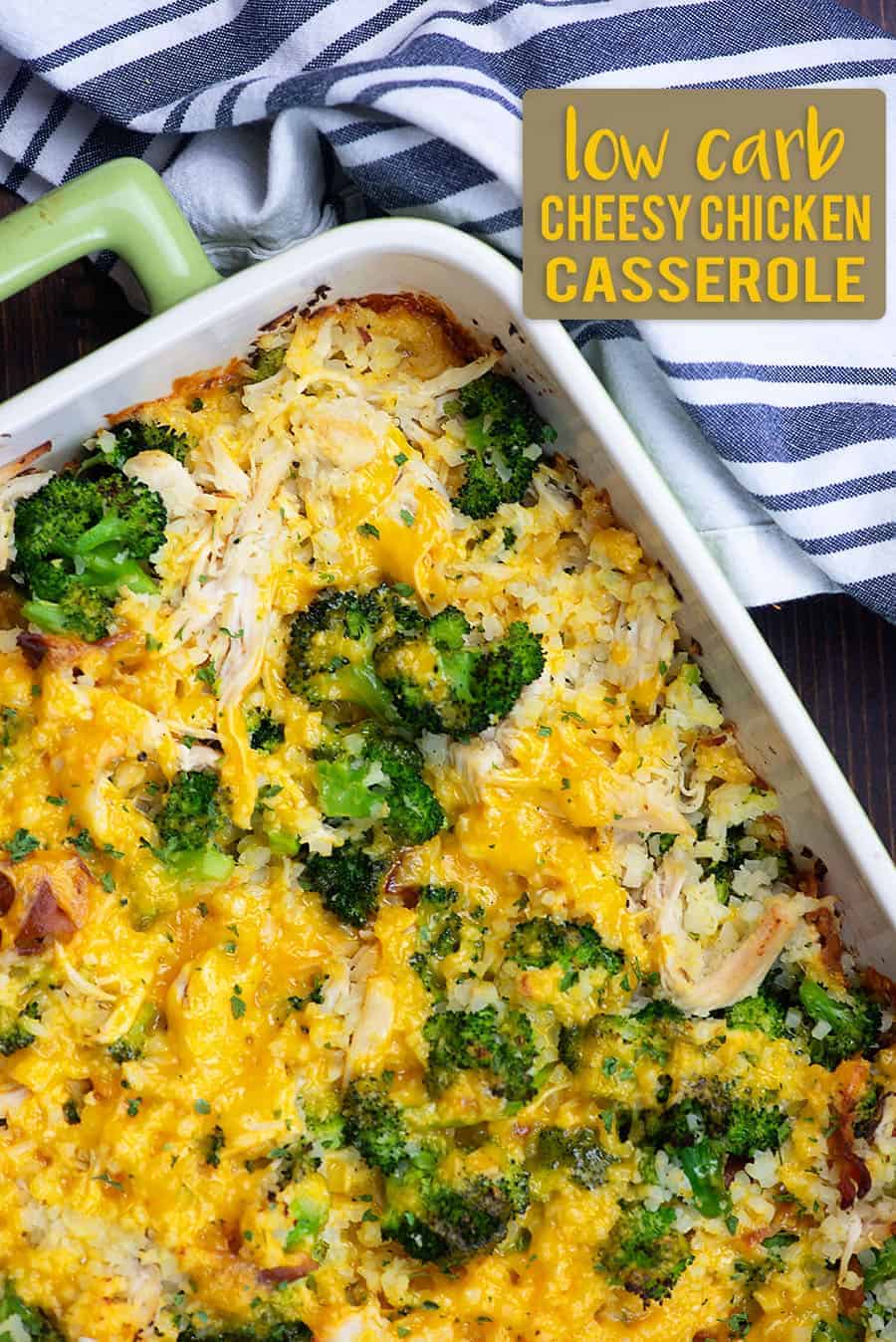 cheesy chicken and cauliflower casserole in green baking dish
