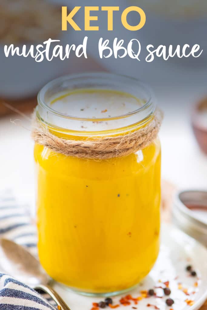 Mason jar full of keto mustard bbq sauce.