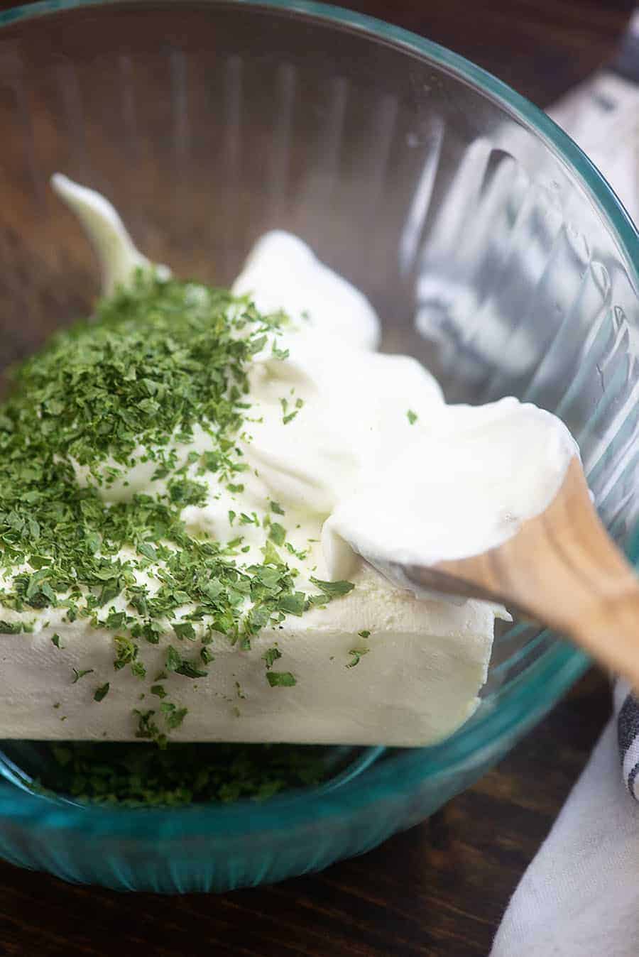 cream cheese mixture for million dollar spaghetti in glass bowl