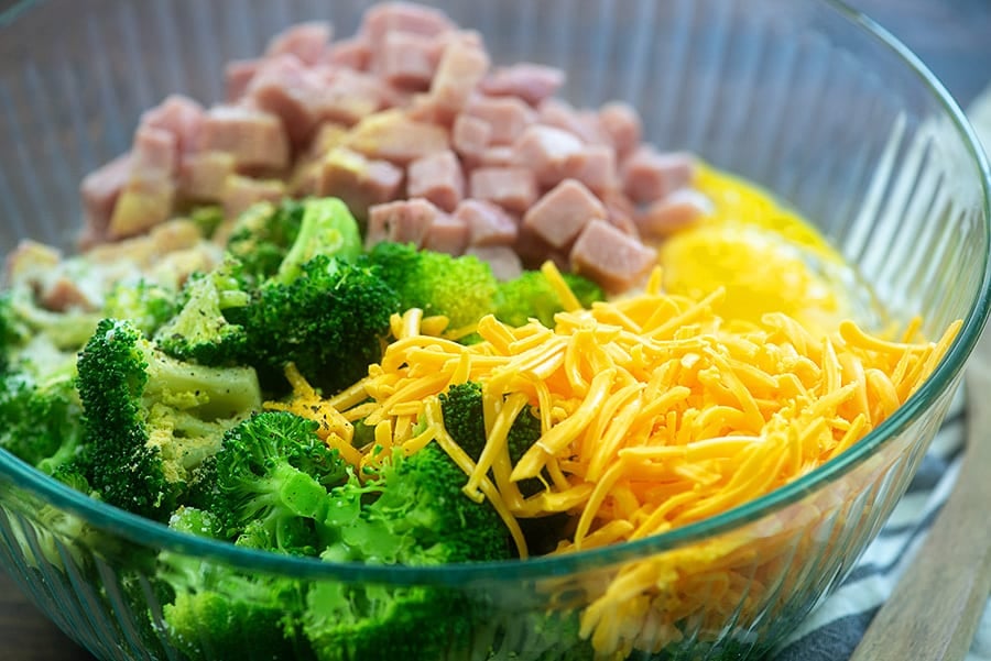 ingredients for ham casserole in glass bowl