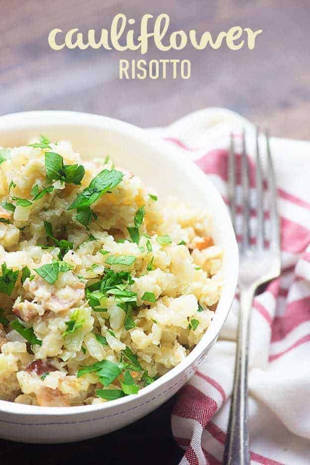 A close up of cauliflower risotto in a white bowl