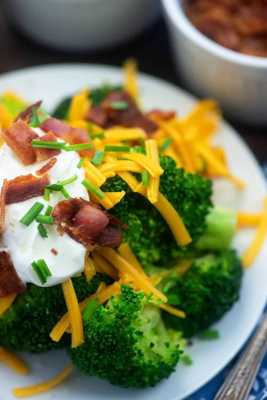 loaded broccoli on a plate close up