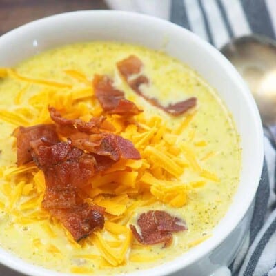A bowl of soup, with Broccoli and Cheese soup