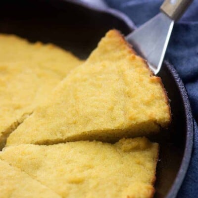 A bowl of food, with Cornbread