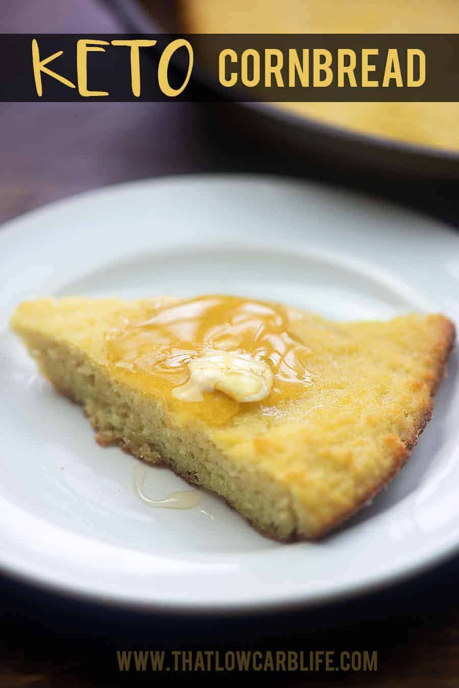 A slice of cornbread topped with butter and honey