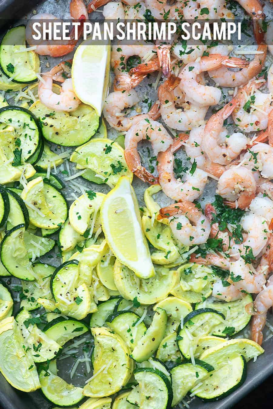 shrimp scampi squash and lemons on a sheet pan