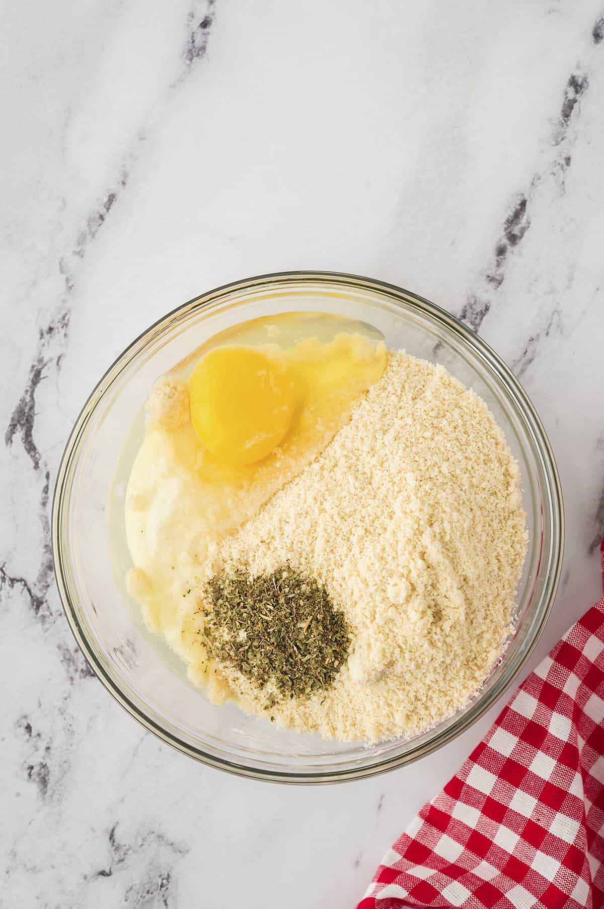 ingredients for fathead pizza crust in glass bowl