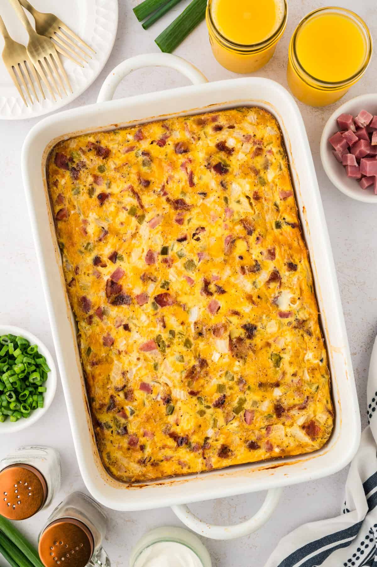 Baked breakfast casserole with ham in 9x13 baking dish.