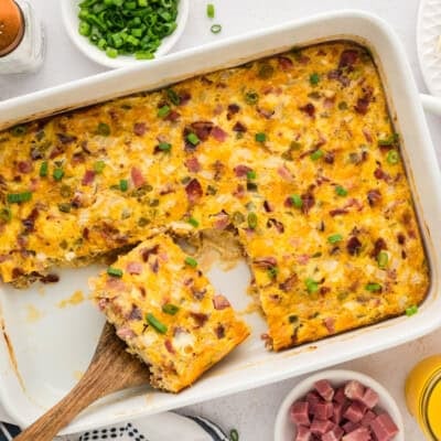 Slices of breakfast casserole in white dish.