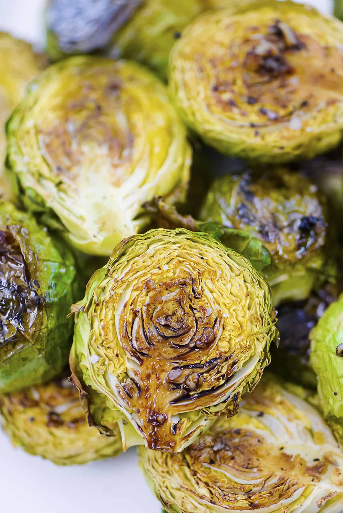 Balsamic roasted Brussels sprouts piled together.