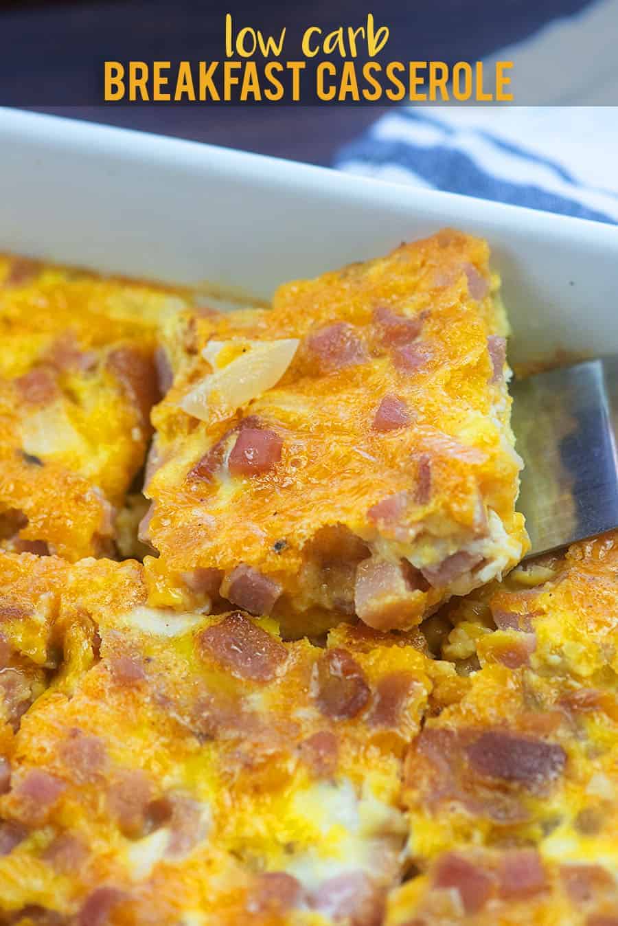 spatula scooping breakfast casserole out of a pan