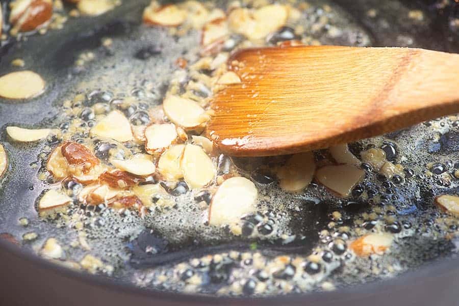 butter and almonds in skillet