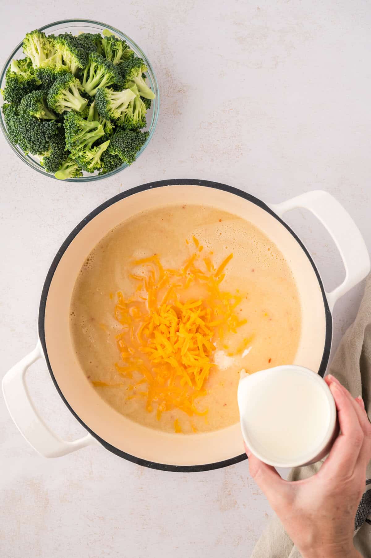 Cheese and cream in cauliflower soup.