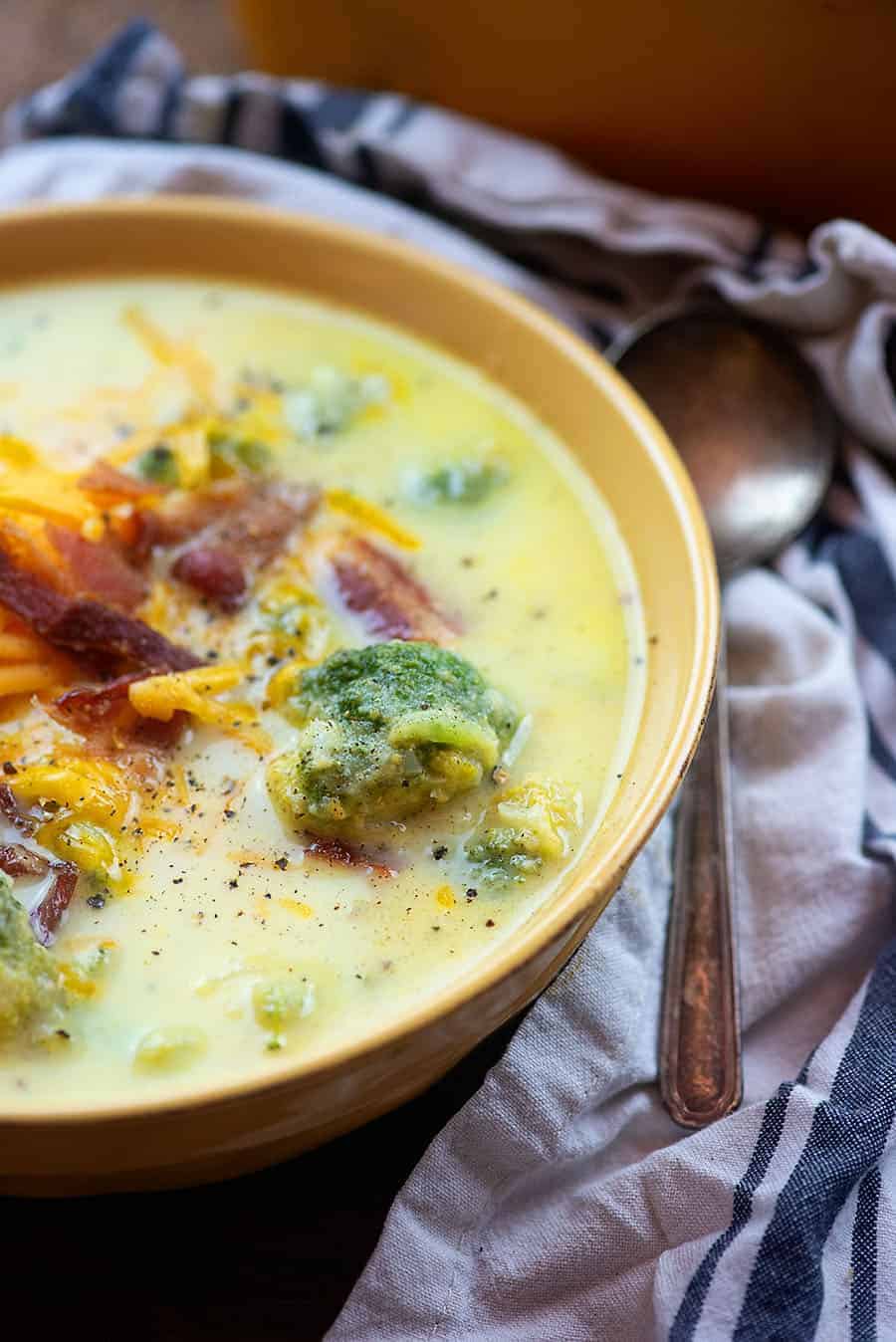 A bowl of food, with Soup and Cauliflower