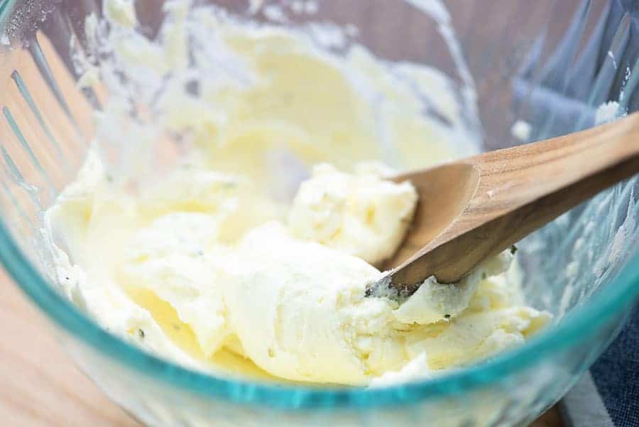 cream cheese mixture for buffalo chicken pizza in glass bowl