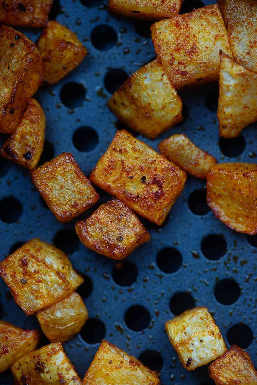 cooked turnips on an air fryer pan