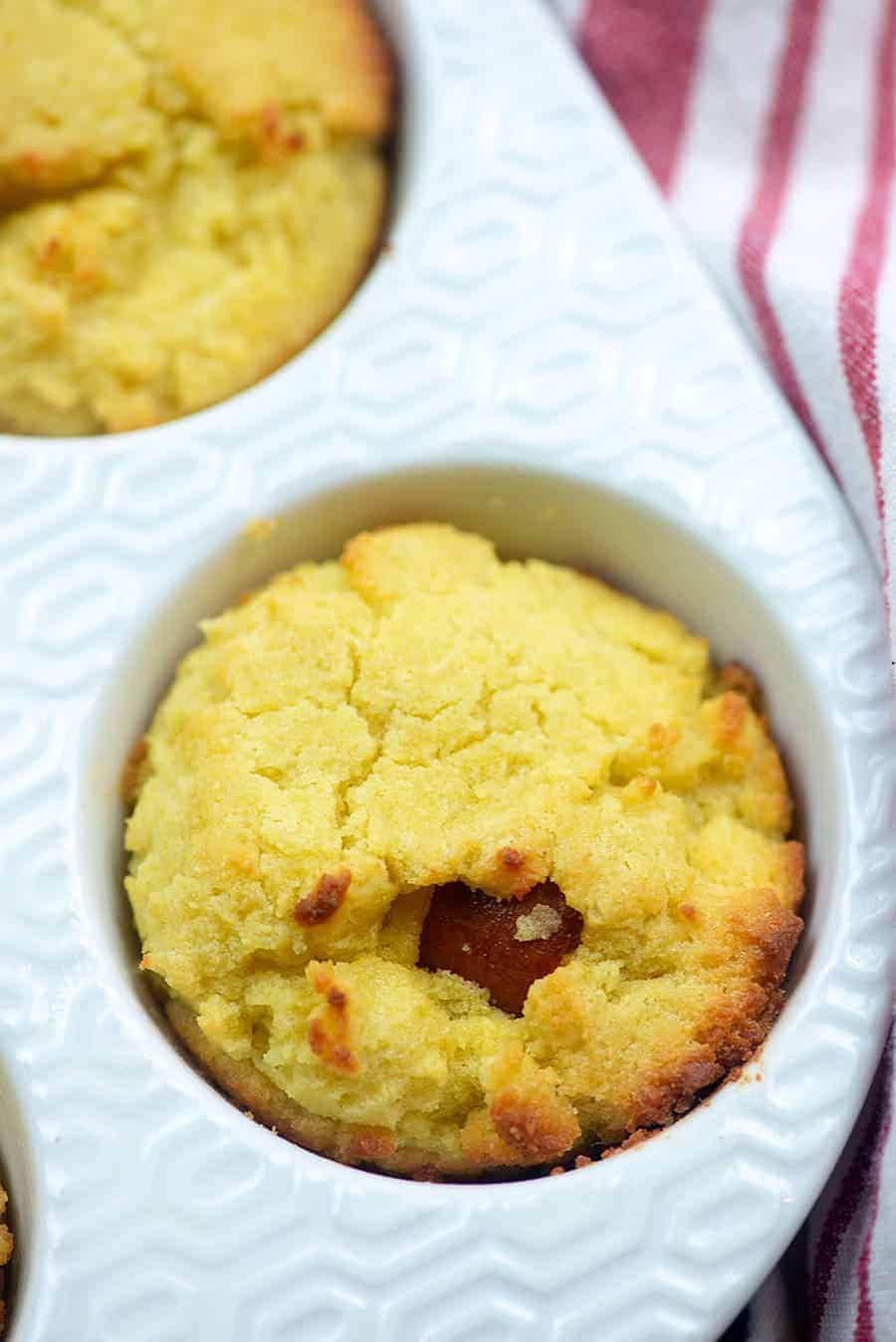 white muffin pan with cornbread muffins