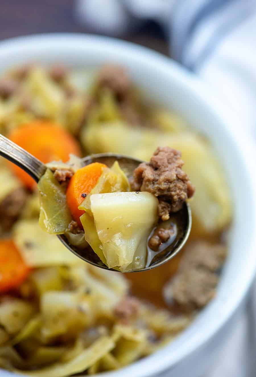 A bowl of food, with Cabbage and Soup