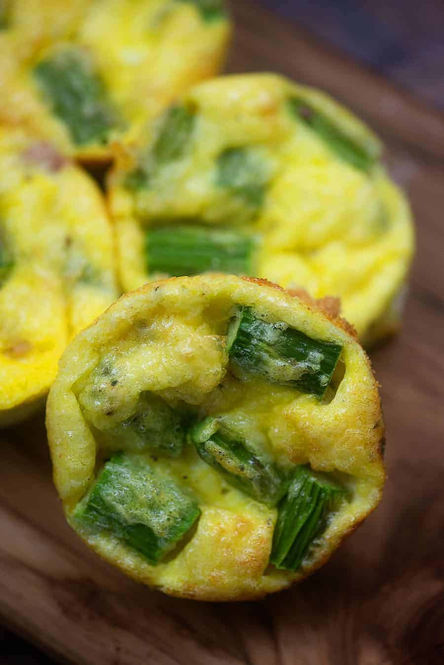 Quiche on a wooden cutting board