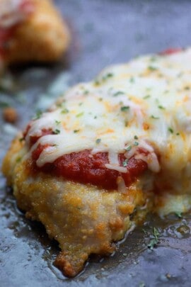 Low carb chicken parmesan doesn't get any easier than this! Crunchy chicken, delicious tomato sauce, and plenty of melty cheese! 