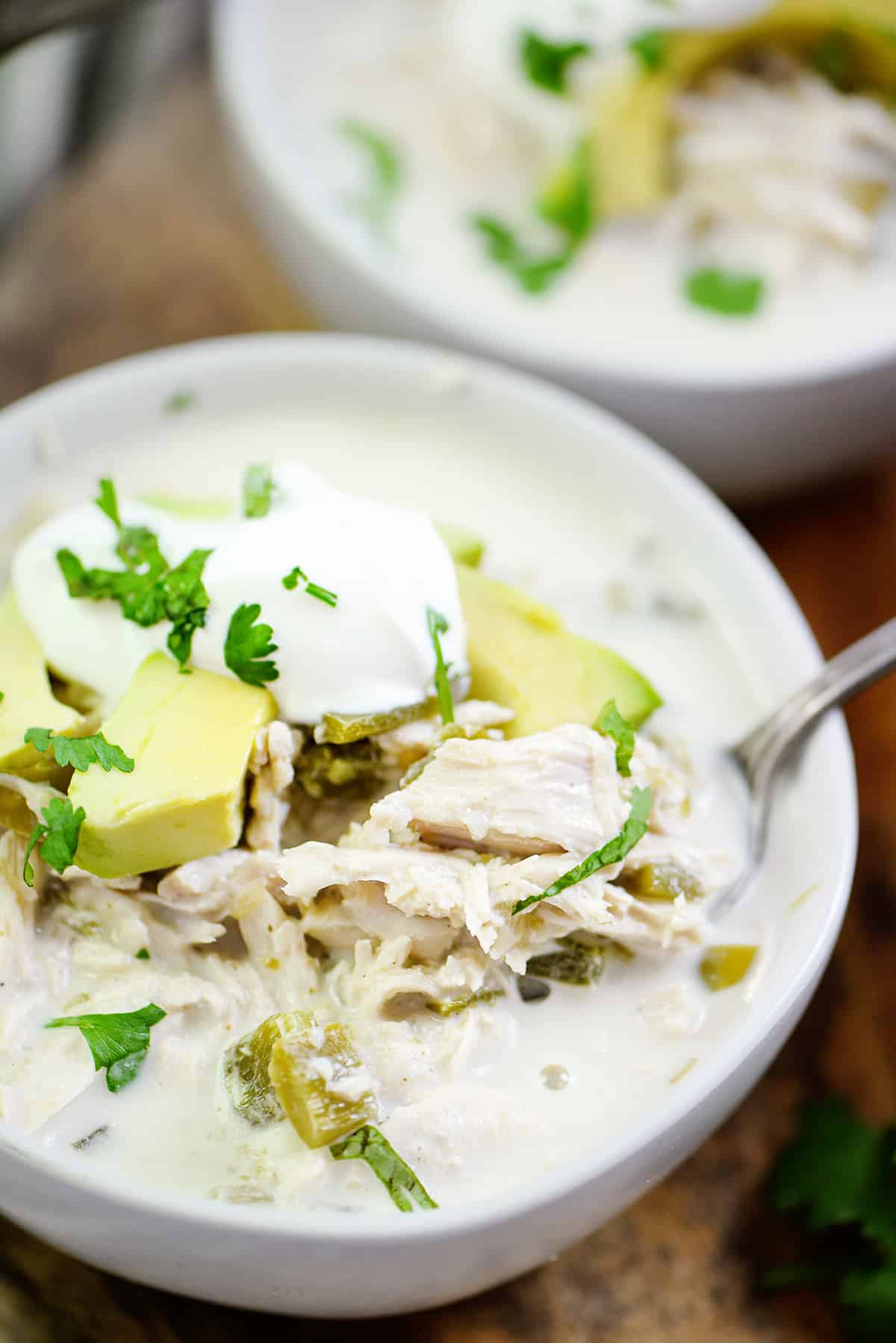 Keto white chicken chili in white bowl.