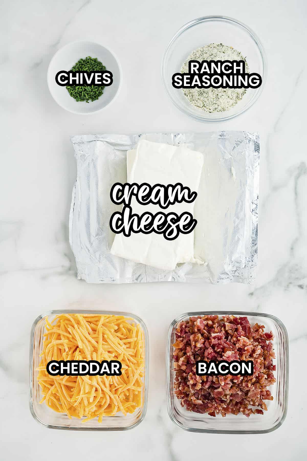 Ingredients for bacon ranch cheese ball recipe laid out on counter.