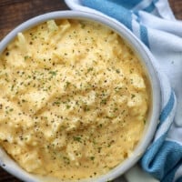 A bowl of food, with Cauliflower and Cheese