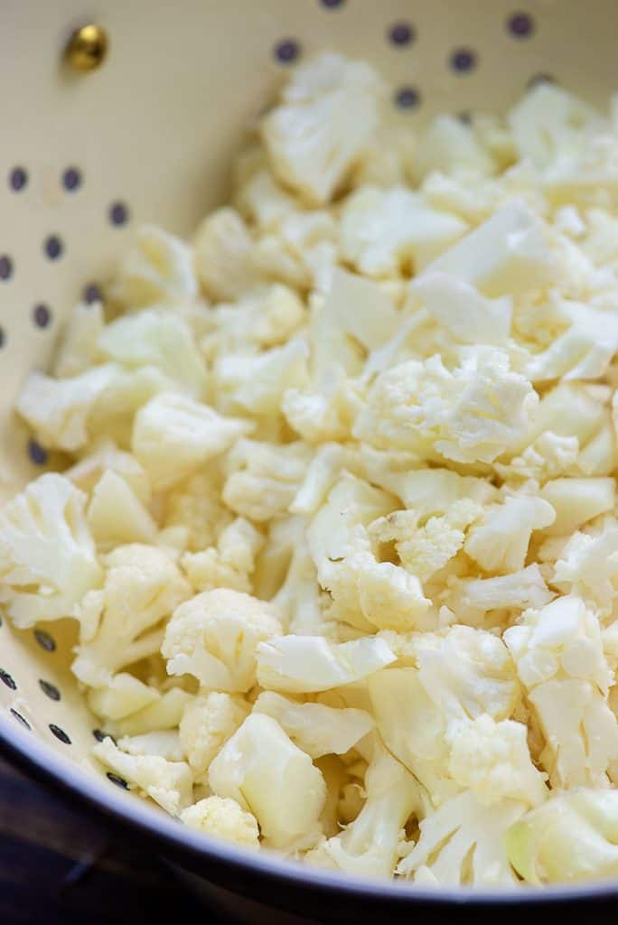 chopped cauliflower in colander