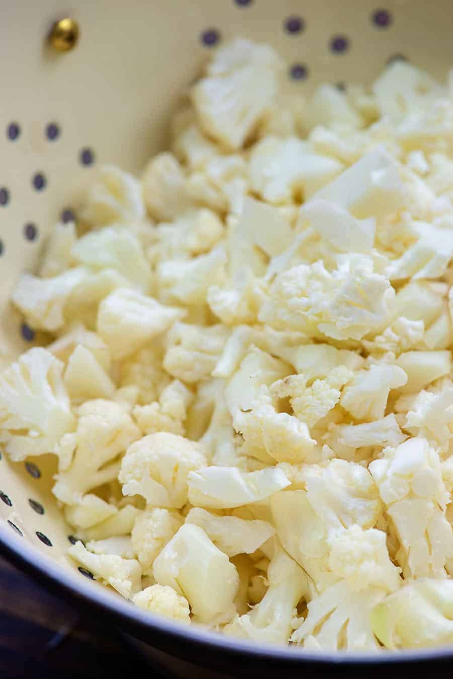 chopped cauliflower in colander