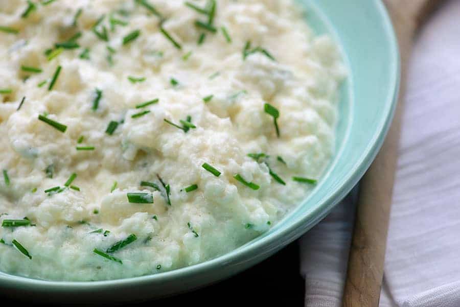 mashed turnips in blue bowl