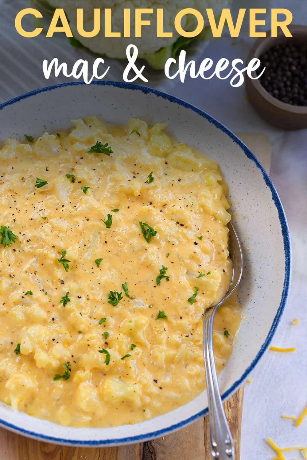 bowl of cauliflower mac and cheese with text for pinterest.